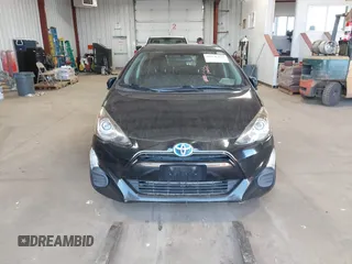 2016 Toyota Prius c One with VIN JTDKDTB3XG1124674, listed as a IAAI auction lot 41976438 with 72,028 mi miles. Bid and sale history available at carsss.com. Image 12.