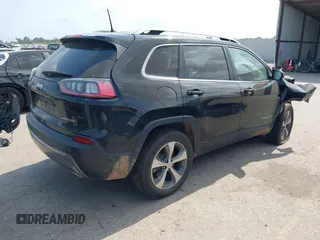 2021 Jeep Cherokee Limited with VIN 1C4PJLDX8MD183389, listed as a IAAI auction lot 42286478 with 93,677 mi miles and . Bid and sale history available at DreamBid. Image 4.
