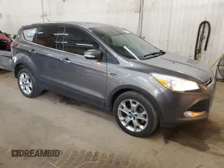 2013 Ford Escape SEL with VIN 1FMCU9H9XDUB66299, listed as a Copart auction lot 52802395 with 135,906 mi miles and Salvage Title. Bid and sale history available at carsss.com. Image 4.