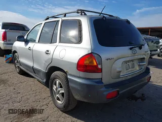 2004 Hyundai Santa Fe GLS with VIN KM8SC13EX4U799955, listed as a IAAI auction lot 41240442 with 281,394 mi miles. Bid and sale history available at carsss.com. Image 3.