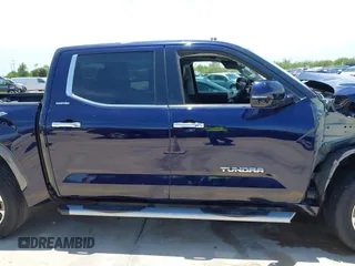 2023 Toyota Tundra Limited with VIN 5TFJA5DB9PX117183, listed as a IAAI auction lot 42352970 with 15,082 mi miles and . Bid and sale history available at DreamBid. Image 13.