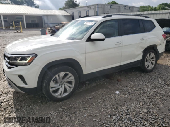 2023 Volkswagen Atlas SE with VIN 1V2KR2CA2PC524739, listed as a Copart auction lot 56976715 with 58,736 mi miles and Salvage title. Bid and sale history available at DreamBid. Image 1.
