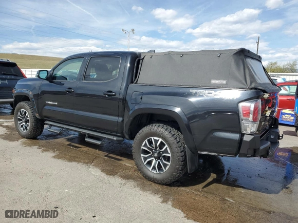 2020 Toyota Tacoma 4WD SR5 with VIN 3TMCZ5AN3LM332543, listed as a Copart auction lot 50872735 with 92,396 mi miles and Salvage Title. Bid and sale history available at carsss.com. Image 2.