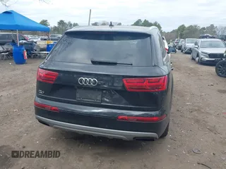 2019 Audi Q7 Premium with VIN WA1AAAF74KD002299, listed as a IAAI auction lot 42066717 with 91,898 mi miles and . Bid and sale history available at DreamBid. Image 16.