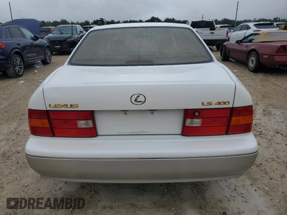 2000 Lexus LS 400 z VIN JT8BH28FXY0178613, wystawiony jako Copart lot #74883444 z przebiegiem Nie podano mil oraz Szkoda całkowita • Salvage title. Historia ofert i sprzedaży dostępna na DreamBid. Obrazek 6.