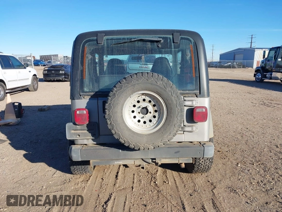2001 Jeep Wrangler Sport with VIN 1J4FA49S91P324912, listed as a IAAI auction lot 41261214 with 260,299 mi miles. Bid and sale history available at carsss.com. Image 16.