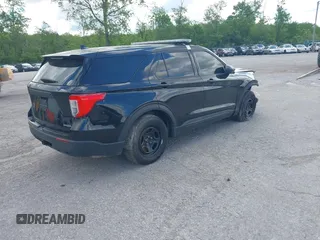 2020 Ford Police Interceptor Utility z VIN 1FM5K8AB4LGB67340, wystawiony jako IAAI lot #41982702 z przebiegiem 37 275 mil mil oraz . Historia ofert i sprzedaży dostępna na DreamBid. Obrazek 4.
