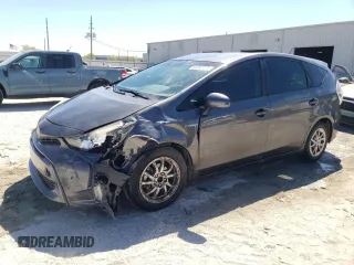 2015 Toyota Prius Two with VIN JTDZN3EU6FJ032945, listed as a Copart auction lot 50202475 with 140,765 mi miles and Salvage Title. Bid and sale history available at DreamBid. Image 1.