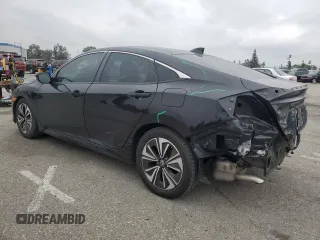 2016 Honda Civic EX-T z VIN 2HGFC1F33GH634029, wystawiony jako Copart lot #56026045 z przebiegiem 168 676 mil mil oraz Szkoda całkowita • Salvage title. Historia ofert i sprzedaży dostępna na DreamBid. Obrazek 2.