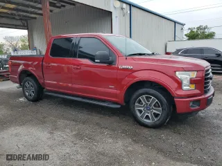 2015 Ford F-150 XL with VIN 1FTEW1CG2FFC86975, listed as a Copart auction lot 50244235 with 96,757 mi miles and Salvage Title. Bid and sale history available at carsss.com. Image 4.