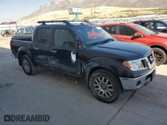 2012 Nissan Frontier SV with VIN 1N6AD0EV2CC459544, listed as a Copart auction lot 75470014 with 101,565 mi miles and Salvage title. Bid and sale history available at DreamBid. Image 4.