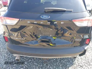 2020 Ford Escape Titanium Hybrid z VIN 1FMCU9DZ9LUC35844, wystawiony jako IAAI lot #42058275 z przebiegiem 74 205 mil mil oraz . Historia ofert i sprzedaży dostępna na DreamBid. Obrazek 6.