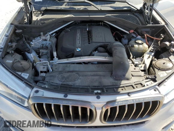 2018 BMW X6 sDrive35i with VIN 5UXKU0C5XJ0G69741, listed as a Copart auction lot 77366934 with 66,287 mi miles and Salvage Title. Bid and sale history available at carsss.com. Image 12.
