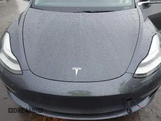 2018 Tesla Model 3 Long Range Battery with VIN 5YJ3E1EB7JF114305, listed as a IAAI auction lot 41765994 with 76,945 mi miles and . Bid and sale history available at DreamBid. Image 10.