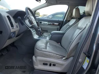 2009 Lincoln MKX with VIN 2LMDU88C69BJ13322, listed as a Copart auction lot 70686844 with 129,384 mi miles and Salvage Title. Bid and sale history available at carsss.com. Image 7.