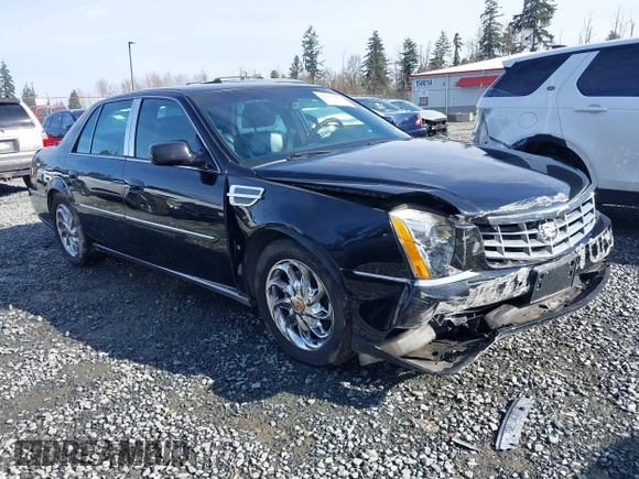 2006 Cadillac DTS 1SC z VIN 1G6KD57YX6U100634, wystawiony jako IAAI lot #41671007 z przebiegiem Nie podano mil oraz . Historia ofert i sprzedaży dostępna na DreamBid. Obrazek 1.