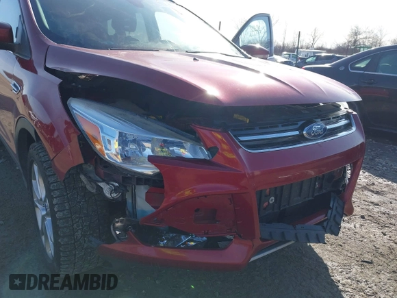 2015 Ford Escape Titanium z VIN 1FMCU9J9XFUC75357, wystawiony jako IAAI lot #41705474 z przebiegiem 198 381 mil mil oraz . Historia ofert i sprzedaży dostępna na DreamBid. Obrazek 6.