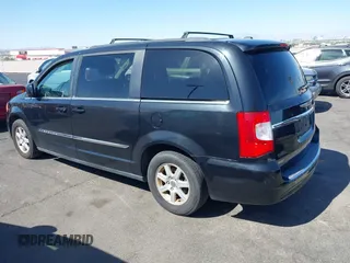 2011 Chrysler Town & Country Touring with VIN 2A4RR5DG2BR702731, listed as a IAAI auction lot 42095661 with 202,968 mi miles and . Bid and sale history available at DreamBid. Image 3.
