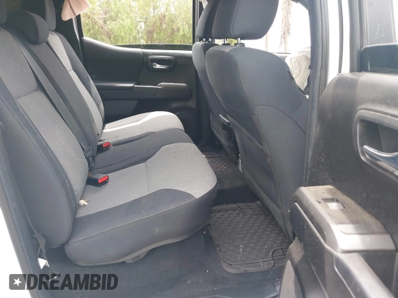 2023 Toyota Tacoma SR with VIN 3TMCZ5AN1PM556299, listed as a IAAI auction lot 42344160 with 42,338 mi miles and . Bid and sale history available at DreamBid. Image 8.