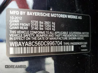 2013 BMW 7 Series 750i with VIN WBAYA8C56DC996704, listed as a Copart auction lot 64466705 with 102,278 mi miles and Salvage title. Bid and sale history available at DreamBid. Image 13.