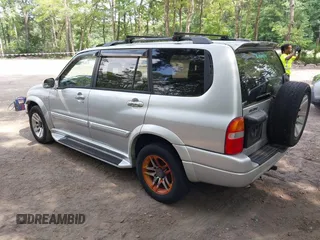 2002 Suzuki XL7 Standard z VIN JS3TX92V924105896, wystawiony jako IAAI lot #42869920 z przebiegiem 189 036 mil mil oraz . Historia ofert i sprzedaży dostępna na DreamBid. Obrazek 3.