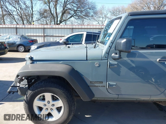 2014 Jeep Wrangler Sport with VIN 1C4AJWAGXEL177449, listed as a IAAI auction lot 41741519 with 117,056 mi miles and . Bid and sale history available at carsss.com. Image 17.