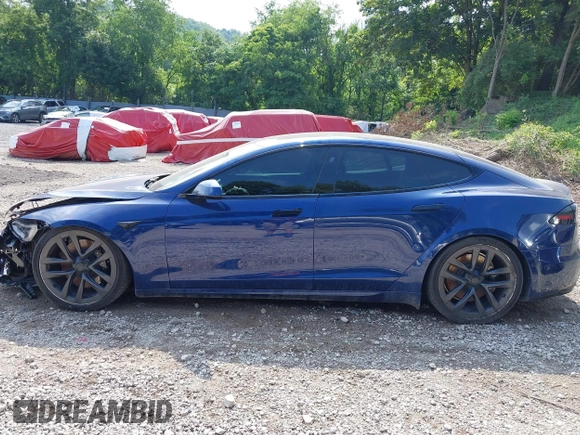 2022 Tesla Model S with VIN 5YJSA1E55NF486443, listed as a IAAI auction lot 42720110 with Not provided miles and . Bid and sale history available at DreamBid. Image 15.
