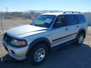 2003 Mitsubishi Montero Sport ES with VIN JA4LS21H23J002736, listed as a IAAI auction lot 41663572 with 235,704 mi miles. Bid and sale history available at carsss.com. Image 2.