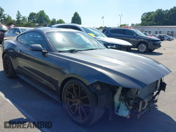 2015 Ford Mustang EcoBoost with VIN 1FA6P8TH8F5394953, listed as a IAAI auction lot 42618352 with 101,302 mi miles and . Bid and sale history available at DreamBid. Image 1.