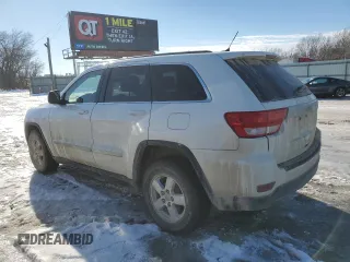 2012 Jeep Grand Cherokee Laredo with VIN 1C4RJFAG2CC267890, listed as a Copart auction lot 87832115 with 171,552 mi miles and Salvage Title. Bid and sale history available at carsss.com. Image 2.