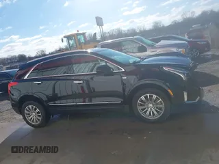 2017 Cadillac XT5 Luxury FWD with VIN 1GYKNBRS5HZ164209, listed as a IAAI auction lot 41213572 with 144,039 mi miles. Bid and sale history available at carsss.com. Image 13.