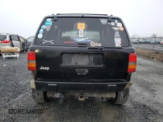 1998 Jeep Grand Cherokee Laredo with VIN 1J4GZ48S0WC171138, listed as a Copart auction lot 85502794 with 0 mi miles and Salvage Title. Bid and sale history available at carsss.com. Image 6.