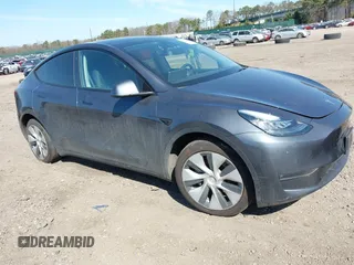 2022 Tesla Model Y Long Range with VIN 7SAYGDEE2NF460945, listed as a IAAI auction lot 41921645 with 62,318 mi miles and . Bid and sale history available at DreamBid. Image 1.