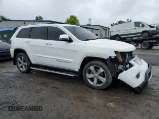 2014 Jeep Grand Cherokee Limited with VIN 1C4RJFBG9EC200141, listed as a Copart auction lot 60507385 with 101,917 mi miles and Salvage title. Bid and sale history available at DreamBid. Image 4.