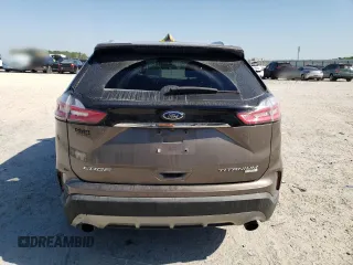 2019 Ford Edge Titanium z VIN 2FMPK3K94KBB39034, wystawiony jako Copart lot #51453215 z przebiegiem 141 741 mil mil oraz Nie do naprawy • Non repairable. Historia ofert i sprzedaży dostępna na DreamBid. Obrazek 6.