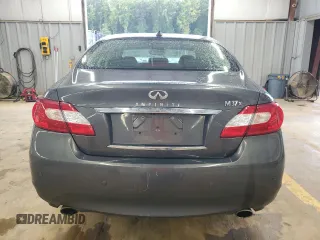2013 Infiniti M with VIN JN1BY1AR3DM603157, listed as a Copart auction lot 73196754 with 77,332 mi miles and Salvage Title. Bid and sale history available at DreamBid. Image 6.