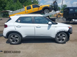 2022 Hyundai Venue SEL z VIN KMHRC8A33NU159516, wystawiony jako IAAI lot #42684907 z przebiegiem 13 674 mil mil oraz . Historia ofert i sprzedaży dostępna na DreamBid. Obrazek 14.