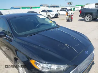 2018 Ford Fusion SE z VIN 3FA6P0H74JR125761, wystawiony jako IAAI lot #41992708 z przebiegiem 102 242 mil mil oraz . Historia ofert i sprzedaży dostępna na DreamBid. Obrazek 6.