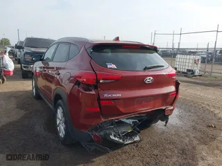 2019 Hyundai Tucson Value with VIN KM8J33A42KU861329, listed as a IAAI auction lot 41679185 with 65,304 mi miles. Bid and sale history available at carsss.com. Image 6.