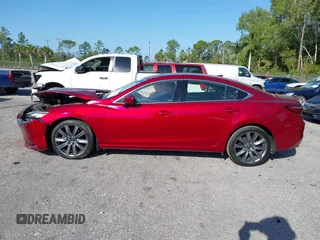 2018 Mazda 6 Grand Touring with VIN JM1GL1TY1J1302146, listed as a IAAI auction lot 41788881 with 55,852 mi miles and . Bid and sale history available at DreamBid. Image 15.