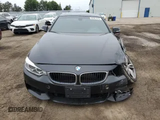 2014 BMW 4 Series 435i xDrive z VIN WBA3R5C5XEK188672, wystawiony jako Copart lot #62351875 z przebiegiem 58 889 mil mil oraz Szkoda całkowita • Salvage title. Historia ofert i sprzedaży dostępna na DreamBid. Obrazek 5.