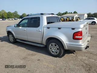 2010 Ford Explorer Sport Trac Limited with VIN 1FMEU3DE5AUF07077, listed as a Copart auction lot 66696134 with 163,753 mi miles and Salvage title. Bid and sale history available at DreamBid. Image 2.