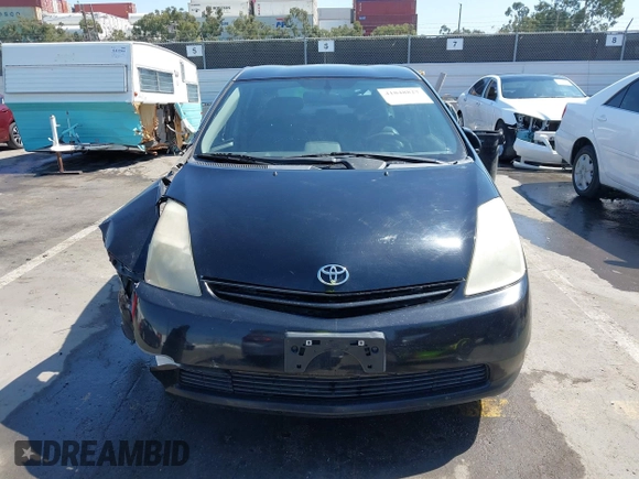 2005 Toyota Prius with VIN JTDKB20U853108017, listed as a IAAI auction lot 41848827 with 218,742 mi miles. Bid and sale history available at carsss.com. Image 12.