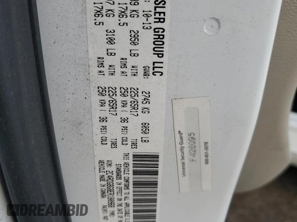 2014 Dodge Grand Caravan SE 30th Anniversary with VIN 2C4RDGBG8ER180968, listed as a Copart auction lot 49465325 with 104,430 mi miles and Salvage Title. Bid and sale history available at DreamBid. Image 13.