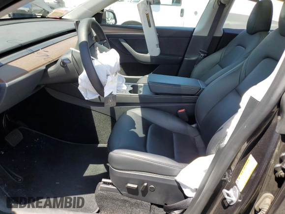 2024 Tesla Model Y с VIN 7SAYGDED5RF177307, выставлен на аукционе Copart как лот 57170315 с пробегом 14 726 миль миль и Списание • Salvage title. История ставок и продаж доступна на DreamBid. Изображение 7.