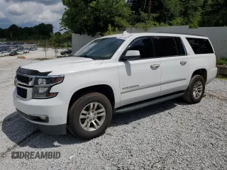2019 Chevrolet Suburban LT with VIN 1GNSCHKC1KR117310, listed as a Copart auction lot 64401125 with 158,224 mi miles and Clean title. Bid and sale history available at DreamBid. Image 1.