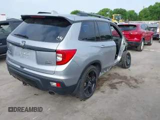 2019 Honda Passport Elite with VIN 5FNYF8H08KB018545, listed as a IAAI auction lot 41923505 with 31,249 mi miles and . Bid and sale history available at carsss.com. Image 4.