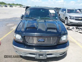 2003 Ford F-150 XLT with VIN 1FTRW07673KD87283, listed as a IAAI auction lot 42687687 with 339,160 mi miles and . Bid and sale history available at DreamBid. Image 6.