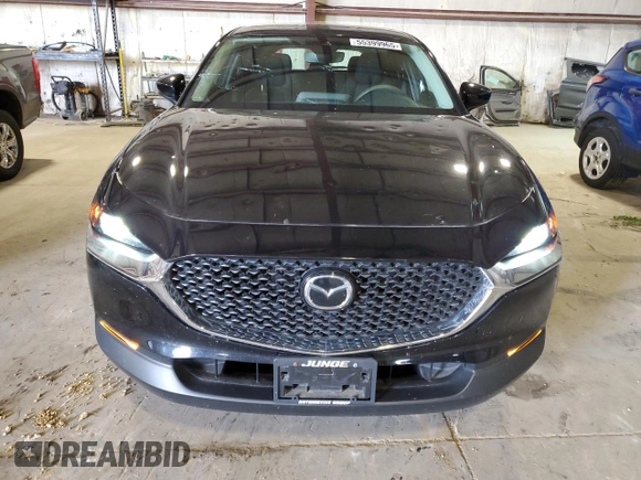 2021 Mazda CX-30 S with VIN 3MVDMBAL2MM207744, listed as a Copart auction lot 55399965 with 49,089 mi miles and Salvage title. Bid and sale history available at DreamBid. Image 5.