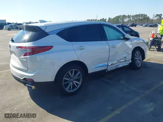 2023 Acura RDX w/Technology Package with VIN 5J8TC1H59PL000180, listed as a IAAI auction lot 41768187 with 23,980 mi miles. Bid and sale history available at carsss.com. Image 4.